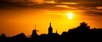 Zonsondergang boven Hasselt van Karel Pops thumbnail