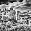 Infrared fairytale surrealist photo of Hohenschwangau castle in black and white monochrome by Hidden Light Gallery