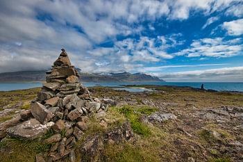 Stone marker by the sea in Iceland