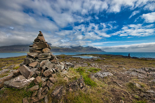 Stone marker by the sea in Iceland