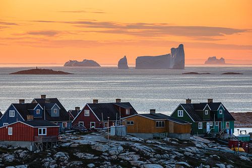 Sunset and icebergs off Aasiaat, Greenland