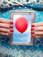 Zwanger, foto rode ballon in zilveren fotolijst