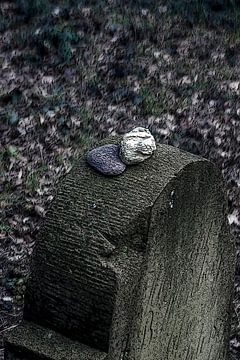 Stenen op een grafsteen van Norbert Sülzner