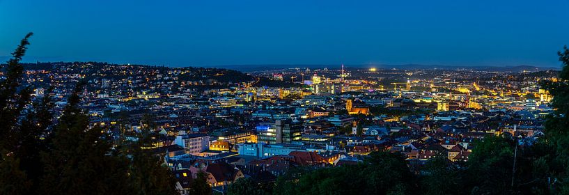 Germany, panorama of illuminated stuttgart city skyline by night by adventure-photos