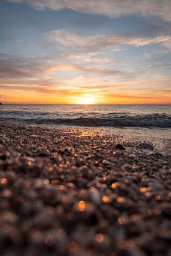 Sunrise on the beach on the coast of Sardinia by Leo Schindzielorz