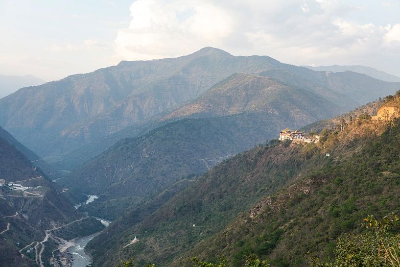 Mountain scenery in Bhutan with view of Trashigang Dzong monastery by WorldWidePhotoWeb