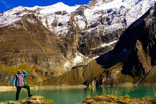 Hikers on a glacier in the mountains