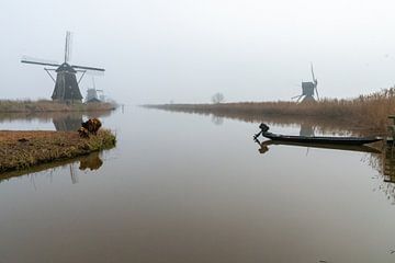 Kinderdijk Windmühle im Nebel von Merijn Loch