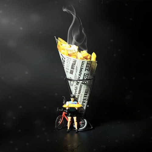 Tipical Dutch bag of fries fries mayo and wheeler .