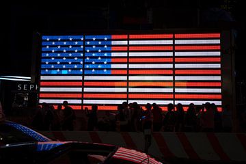 Amerikaanse vlag in New York van Kees van Dun