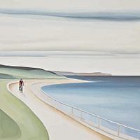 Uitgestrekte kust met wielrenner