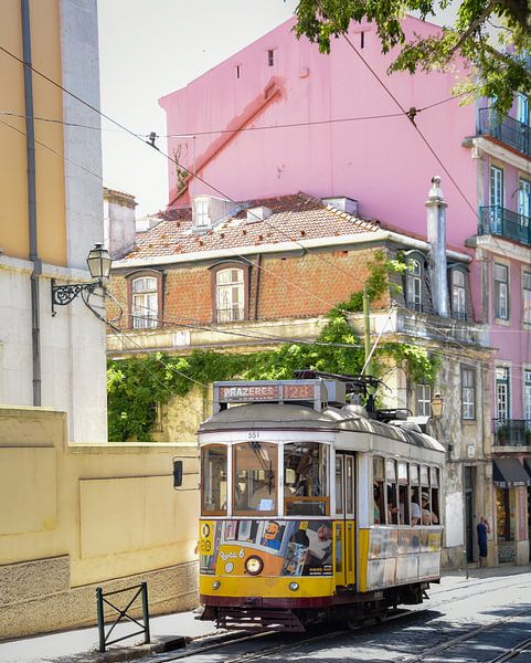 Yellow tram in Lisbon by Merel Pape Photography