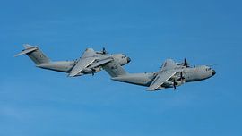 Two Malaysian Airbus A400M transport aircraft.  The Airbus A400M is a military transport aircraft developed by Airbus Military. The first prototype rolled out of the factory on 26 June 2008. The first test flight was conducted on 11 December 2009.  The aircraft was developed by Airbus alongside the Airbus A330 MRTT tanker aircraft and is equipped with turboprop engines. It can land and take off on both paved and unpaved runways.   This picture was taken on 18 May 2025 during LIMA 2025 (Langkawi International Maritime and Aerospace Exhibition). by Jaap van den Berg