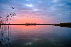 Winter sunset over an empty lake during a beautiful evening by Sjoerd van der Wal Photography
