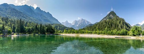 Stunning panorama view over Lake Jasna, Kranjska Gora, Slovenia, with the Alps in the background.