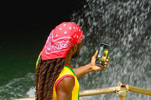 Rastaman with mobile phone