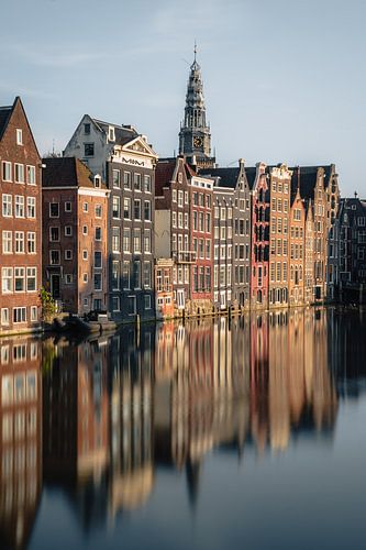 Reflections on the Damrak in Amsterdam
