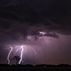 Dubbele blikseminslag in uitgestrekt landschap van Ruben Gielissen