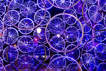 Fietswielen in blauw licht by Ineke Huizing