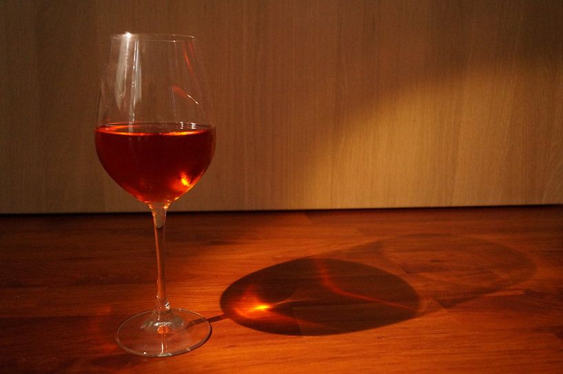 Glass of wine by Andrea Ooms