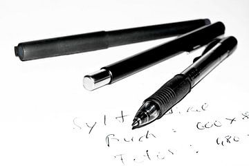 Writing instruments, words, paper