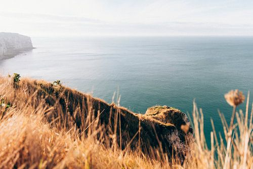 Golden sunset over the cliffs of étretat, France.