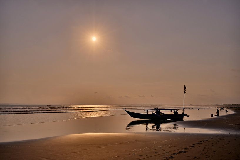 Traditional Indonesian boat at golden twilight by Frank Photos