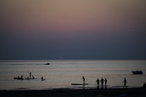 Zonsondergang aan zee