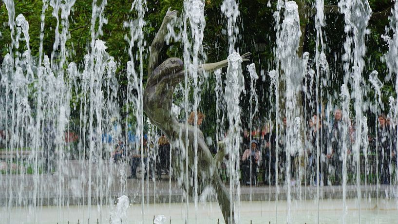 Dancing woman in fountain by Tim Vaal