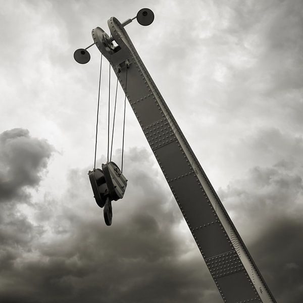 Crane with crane hook in the port of Magdeburg by Heiko Kueverling