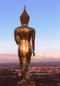 Golden glow on walking Buddha - sunset Thailand Fine Art Prints by Simone Zomerdijk