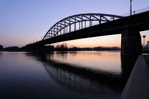 John Frost bridge over the Lower Rhine near Arnhem after sunset