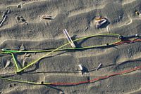 Lijnenspel op het strand