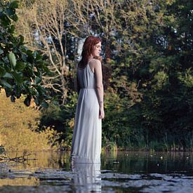 Reflection of woman in white dress by Iris Kelly Kuntkes