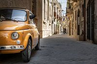 An old Fiat in the center of Syracusa, Sicily, Italy.