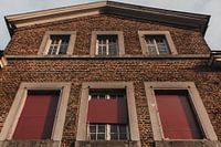 Red Shutters of an Abandoned Castle