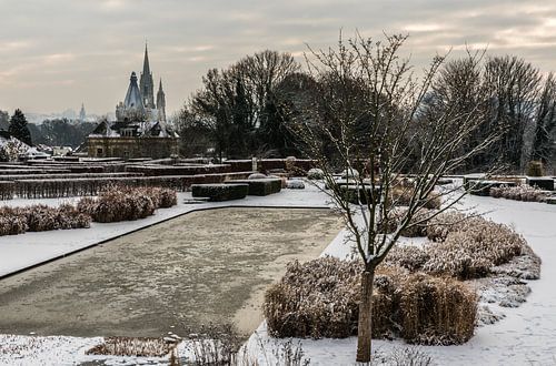 Panoramic view over the Stuyvenberg city park with frozen ponds,