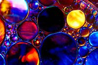 Oil drops on water