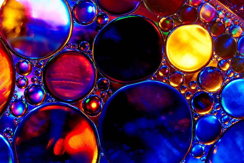 Oil drops on water by Harry Wedzinga