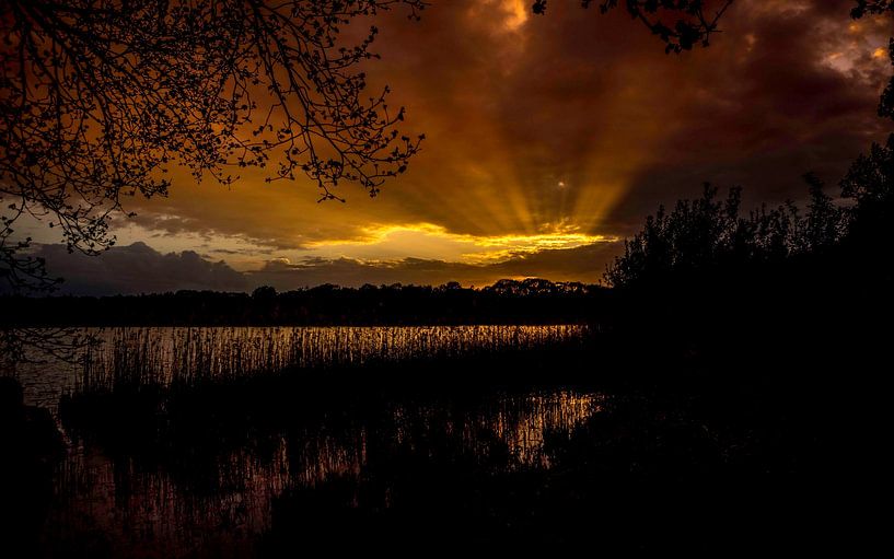 Zonsondergang van Hans de Cortie