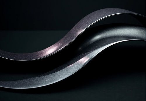 Abstract Image of Two Wavy Metal Bands