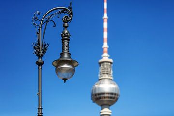 Historical street lamp with television tower in Berlin