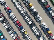 Trucks in a row at a parking lot seen from above by Sjoerd van der Wal Photography thumbnail