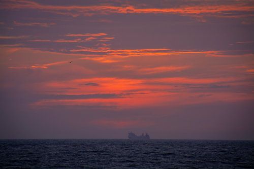 Zonsondergang op zee