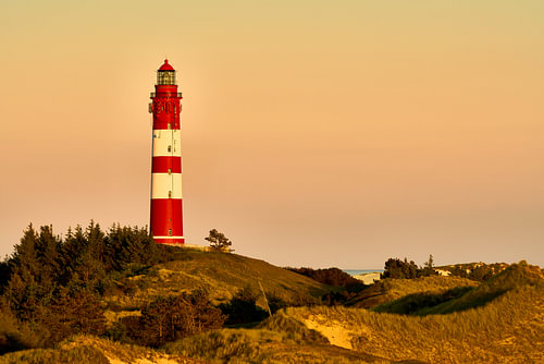 Amrum - vuurtoren in de avond rood