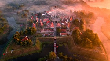 Fortified village of Bourtange in the morning mist by Ewold Kooistra