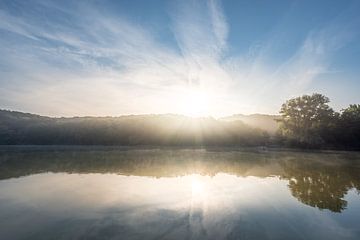 Sunrise at a lake with bridge by John van de Gazelle fotografie