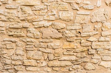 Texture de fond d'un mur de pierre, structure en gros plan sur Alex Winter