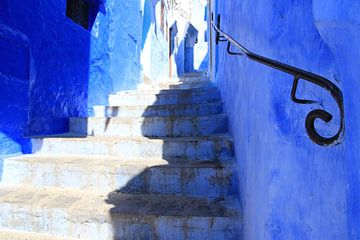 Hold on to the railing in Chefchaouen by Suitcasefullofsmiles