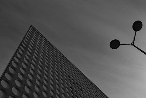 Abstract building with lamppost